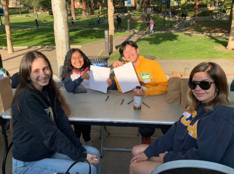 Bruin commuters participating in a eam activity at a commuter buddy social
