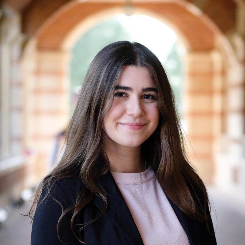 Photo of undergraduate intern, Lori Garavartanian, wearing white blouse and black blazer.